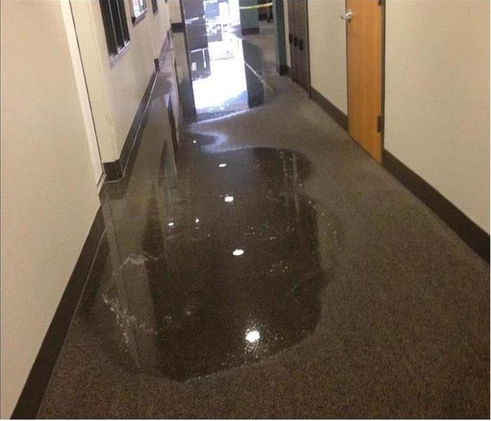water covered floor from burst pipe
