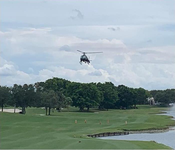 helicopter over a golf course