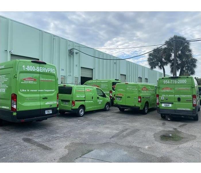 SERVPRO vehicles in front of a SERVPRO facility